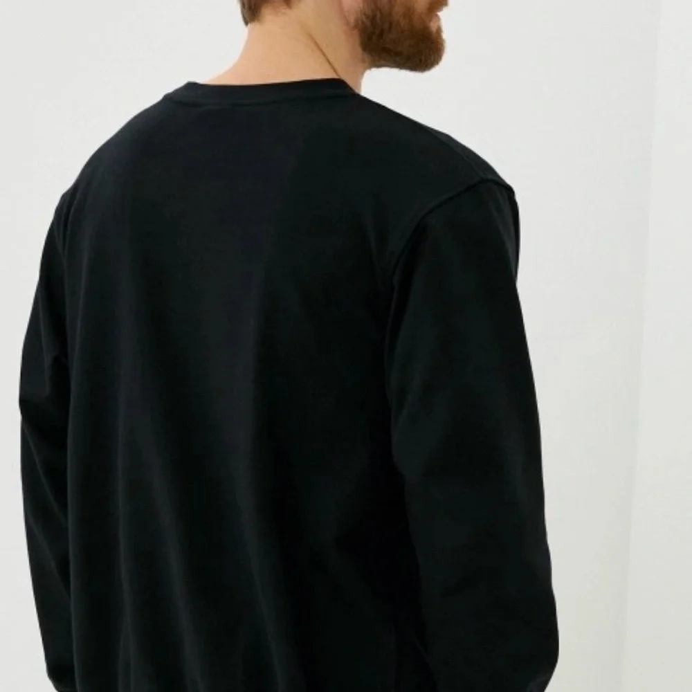 Nike Men's Black Crewneck Sweater with Star Design